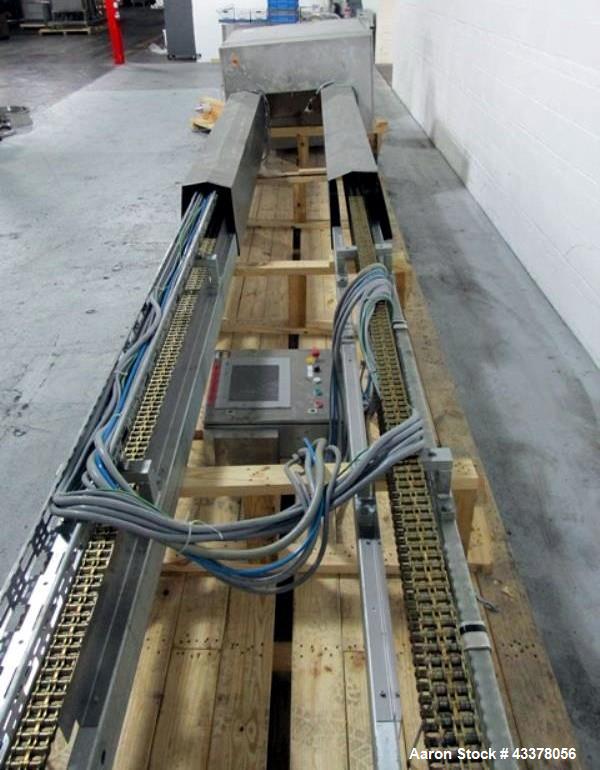 Used LB Bohle Bin Blender, Model PM2000. Stainless steel product contact surfaces, 1500 kw max load capacity, approximately 14' rise, approximately 24'6" overall height, post design with dual columns...