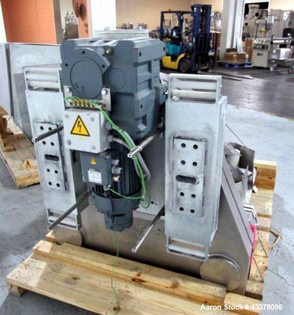Used LB Bohle Bin Blender, Model PM2000. Stainless steel product contact surfaces, 1500 kw max load capacity, approximately 14' rise, approximately 24'6" overall height, post design with dual columns...