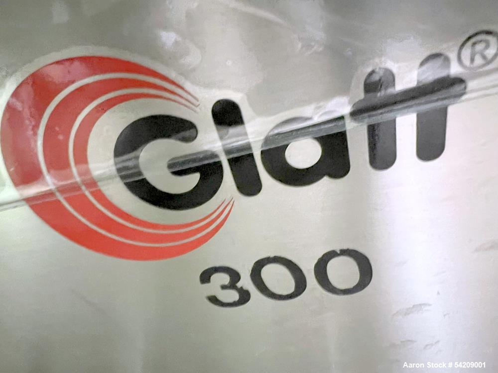 Used Glatt Stainless Steel Column Bin Blender, Model CM 400, Serial# PN 14724, Year 2016. With (1) 500Liter stainless bin, (1) 300 liter stainless bin, (1) 100 liter stainless bin & wall mounted HMI.