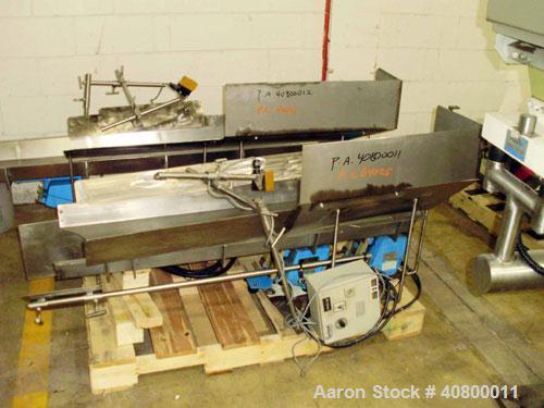 Used Heavy Duty Products Seasoning System, Consisting Of: (1) Acrison feeder, approximately 1 1/2" diameter x 42" long stainless steel tube and screw, includes controller. (1) Syntron vibratory feede...