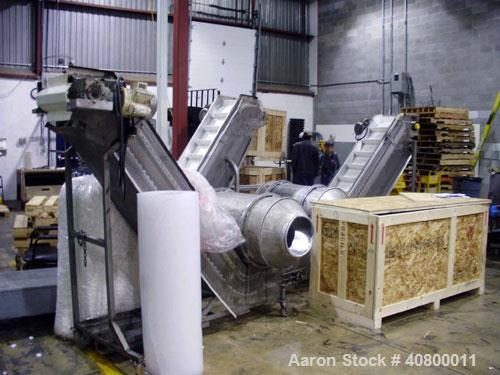 Used Heavy Duty Products Seasoning System, Consisting Of: (1) Acrison feeder, approximately 1 1/2" diameter x 42" long stainless steel tube and screw, includes controller. (1) Syntron vibratory feede...