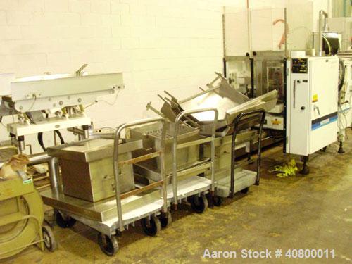 Used Heavy Duty Products Seasoning System, Consisting Of: (1) Acrison feeder, approximately 1 1/2" diameter x 42" long stainless steel tube and screw, includes controller. (1) Syntron vibratory feede...