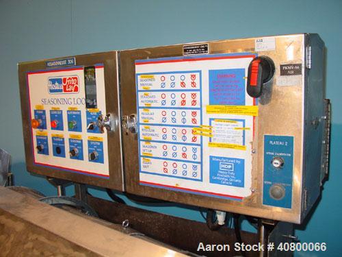 Used Heavy Duty Products Seasoning System, consisting of: (1) Acrison feeder, model 610, approximately 1 1/2" diameter x 42" long stainless steel tube and screw, includes controller. (1) Syntron vibr...