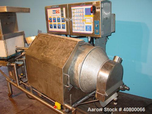 Used Heavy Duty Products Seasoning System, consisting of: (1) Acrison feeder, model 610, approximately 1 1/2" diameter x 42" long stainless steel tube and screw, includes controller. (1) Syntron vibr...