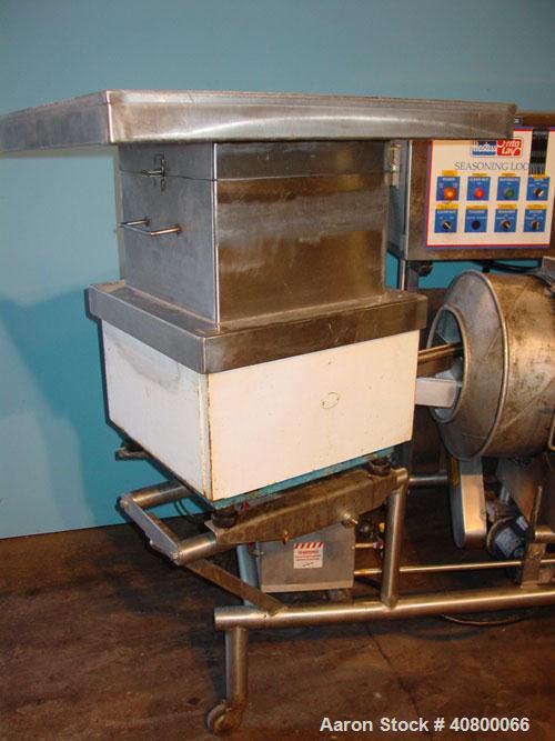 Used Heavy Duty Products Seasoning System, consisting of: (1) Acrison feeder, model 610, approximately 1 1/2" diameter x 42" long stainless steel tube and screw, includes controller. (1) Syntron vibr...