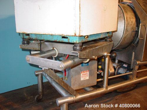Used Heavy Duty Products Seasoning System, consisting of: (1) Acrison feeder, model 610, approximately 1 1/2" diameter x 42" long stainless steel tube and screw, includes controller. (1) Syntron vibr...
