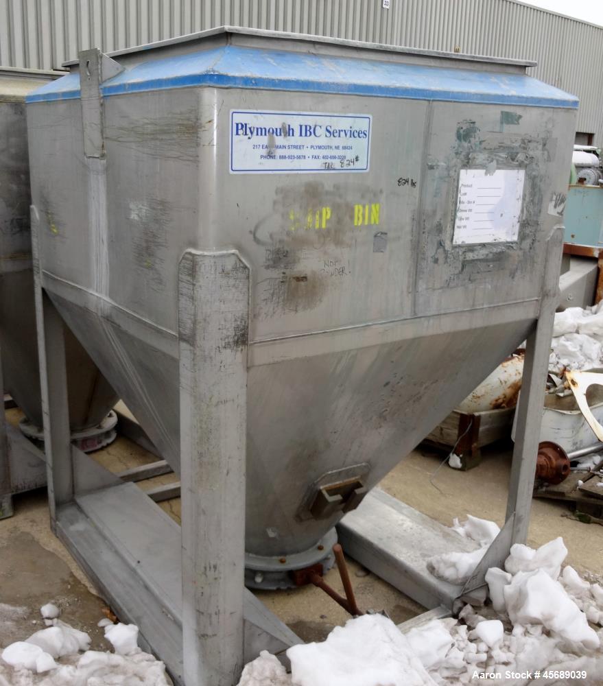 Used Metalcraft Tote Tumbler, Model 31753. Includes (9) Stainless Steel Totes, 55" Wide x 27.5" Straight Side x 42.5" Cone. 43.5" x 43.5" Square Top Opening. Approximate 16" Bottom Outlet. Driven by ...