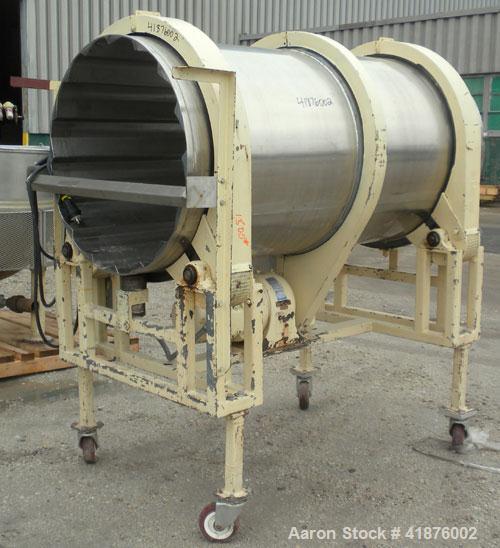 Used Horizontal Drum Tumbler, 316 stainless steel. Approximate 33" diameter x 72" long drum, with internal flights. Driven by a 1 hp, 3/60/208-220/440 volt, 1735 rpm gear motor, 57.6 to 1 ratio, 30 o...