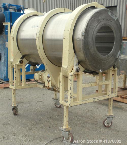 Used Horizontal Drum Tumbler, 316 stainless steel. Approximate 33" diameter x 72" long drum, with internal flights. Driven by a 1 hp, 3/60/208-220/440 volt, 1735 rpm gear motor, 57.6 to 1 ratio, 30 o...