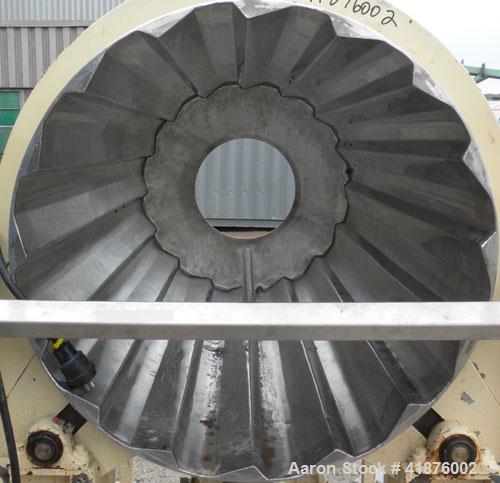 Used Horizontal Drum Tumbler, 316 stainless steel. Approximate 33" diameter x 72" long drum, with internal flights. Driven by a 1 hp, 3/60/208-220/440 volt, 1735 rpm gear motor, 57.6 to 1 ratio, 30 o...