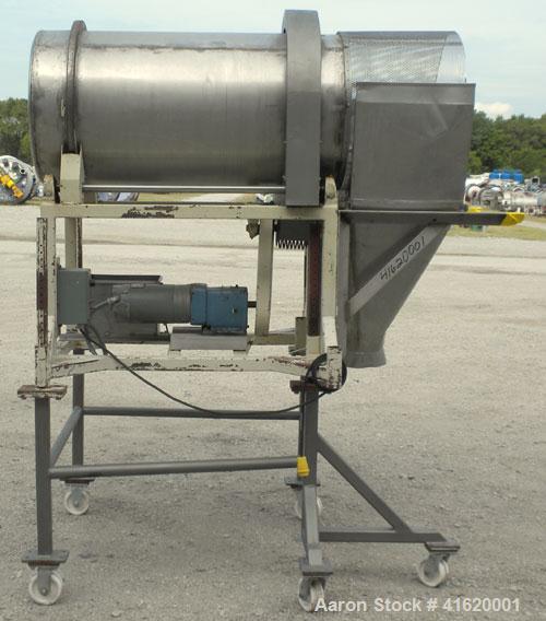 Used Horizontal Drum Tumbler, 316 Stainless Steel. Approximate 24" diameter x 48" long drum, intenal lifters, 17" long screen end section, 1/4" diameter holes. End outlet with chute. Driven by a 3/4 ...