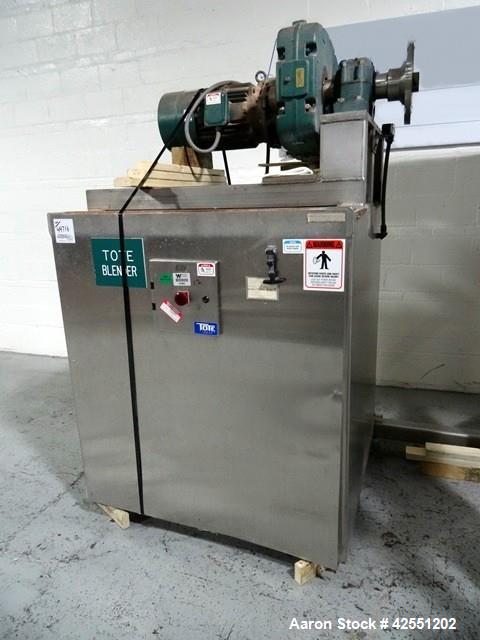Used Tote Systems tote blender, 304 stainless steel construction, 79 cu ft(2500 liter) capacity, on stainless steel stands with 20 hp, 230/460 volt motor drive thru Sumitomo gear box with 76:1 gear b...