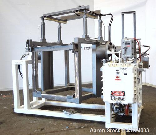 Used Tote Bulk Handling Systems Tote Blender. Will handle approximate 46" wide x 46" long x 48" tall totes. Top pneumatic hold downs. Driven by a 15hp, 3/60/230/460 volt, 1760 rpm hydraulic power pac...