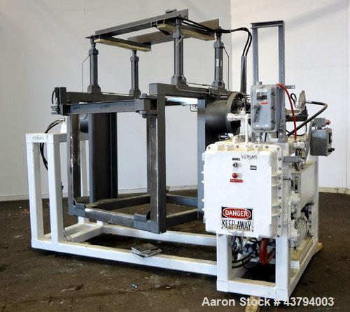 Used Tote Bulk Handling Systems Tote Blender. Will handle approximate 46" wide x 46" long x 48" tall totes. Top pneumatic hold downs. Driven by a 15hp, 3/60/230/460 volt, 1760 rpm hydraulic power pac...