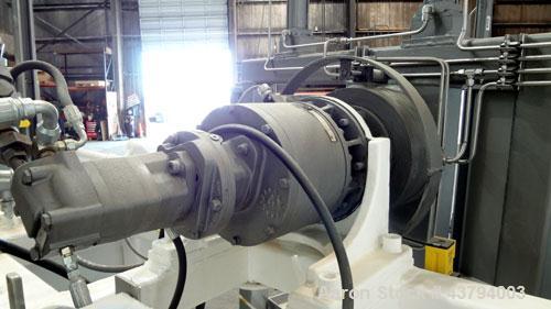 Used Tote Bulk Handling Systems Tote Blender. Will handle approximate 46" wide x 46" long x 48" tall totes. Top pneumatic hold downs. Driven by a 15hp, 3/60/230/460 volt, 1760 rpm hydraulic power pac...