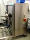 Used Globe Pharma Bin Blender, Model MB-1 2. Stainless steel construction, with 1 and 2 cu. ft. interchangeable stainless steel bins, 208 volts, serial# 12088053B.