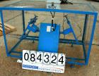 Used Morse Dual Can Tumbler, Model 2-305-1. Capacity (2) 8.5 gallon drums at 100 pounds per drum at 23 rpm. Minimum/maximum height 4-1/2