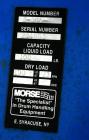 Used Morse Dual Can Tumbler, Model 2-305-1. Capacity (2) 8.5 gallon drums at 100 pounds per drum at 23 rpm. Minimum/maximum height 4-1/2