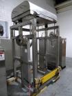Used Tote Systems tote blender, 304 stainless steel construction, 79 cu ft(2500 liter) capacity, on stainless steel stands with 20 hp, 230/460 volt motor drive thru Sumitomo gear box with 76:1 gear b...