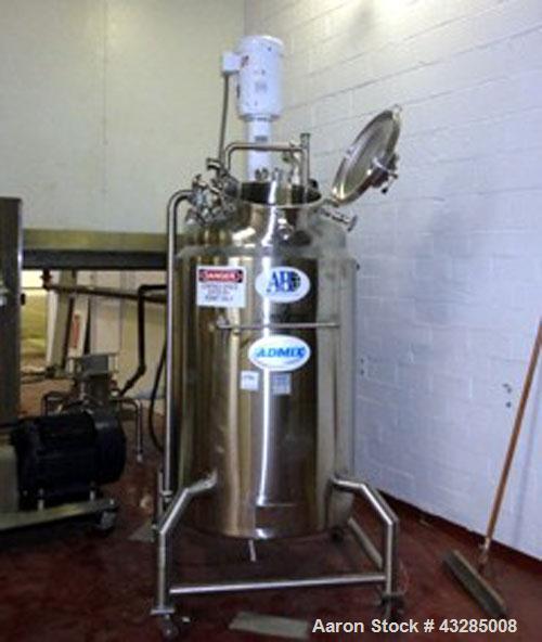 Used Admix Processor, Model VS-130. Mounted on 160 gallon Zimmerlin GMBH kettle, stainless steel. 32" Diameter x 44" straight side, dish top and bottom with jacket. 2" Center bottom outlet. Top mount...
