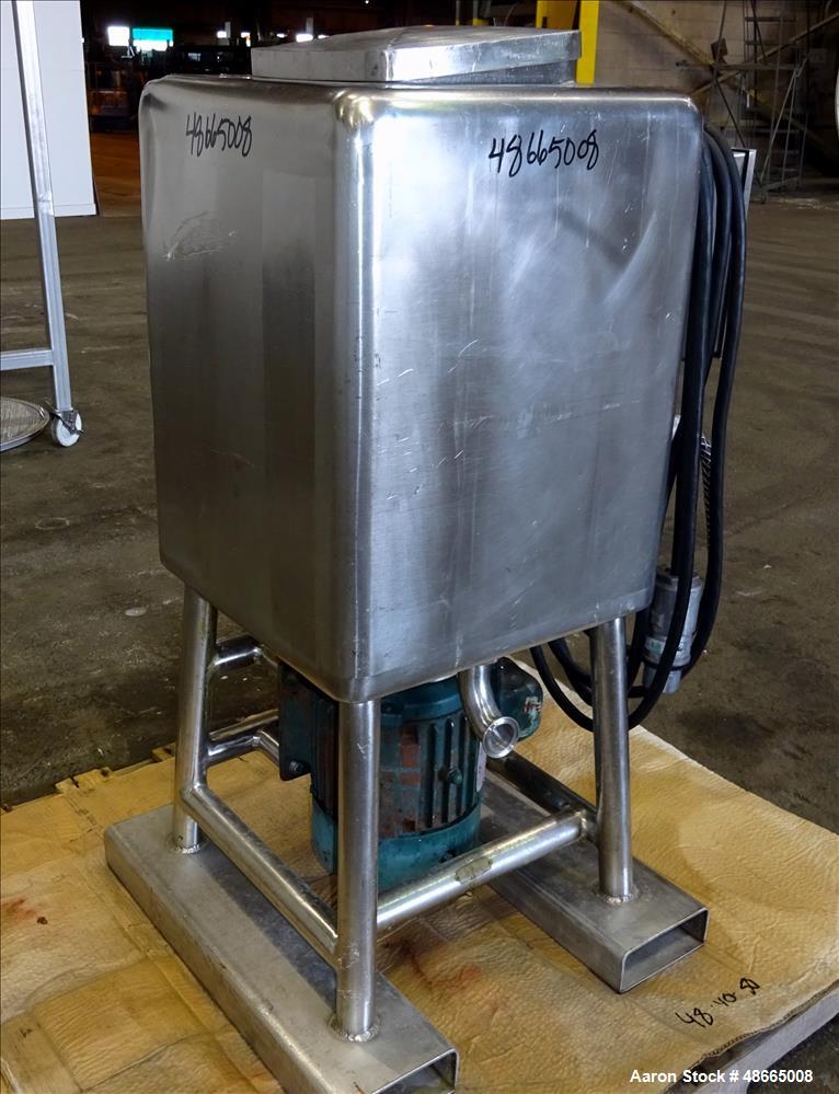 Used Norman Likwifier, 304 Stainless Steel, Approximate 17.5 Gallon, Vertical.