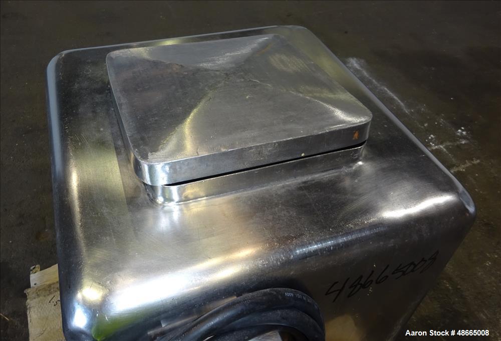 Used Norman Likwifier, 304 Stainless Steel, Approximate 17.5 Gallon, Vertical.