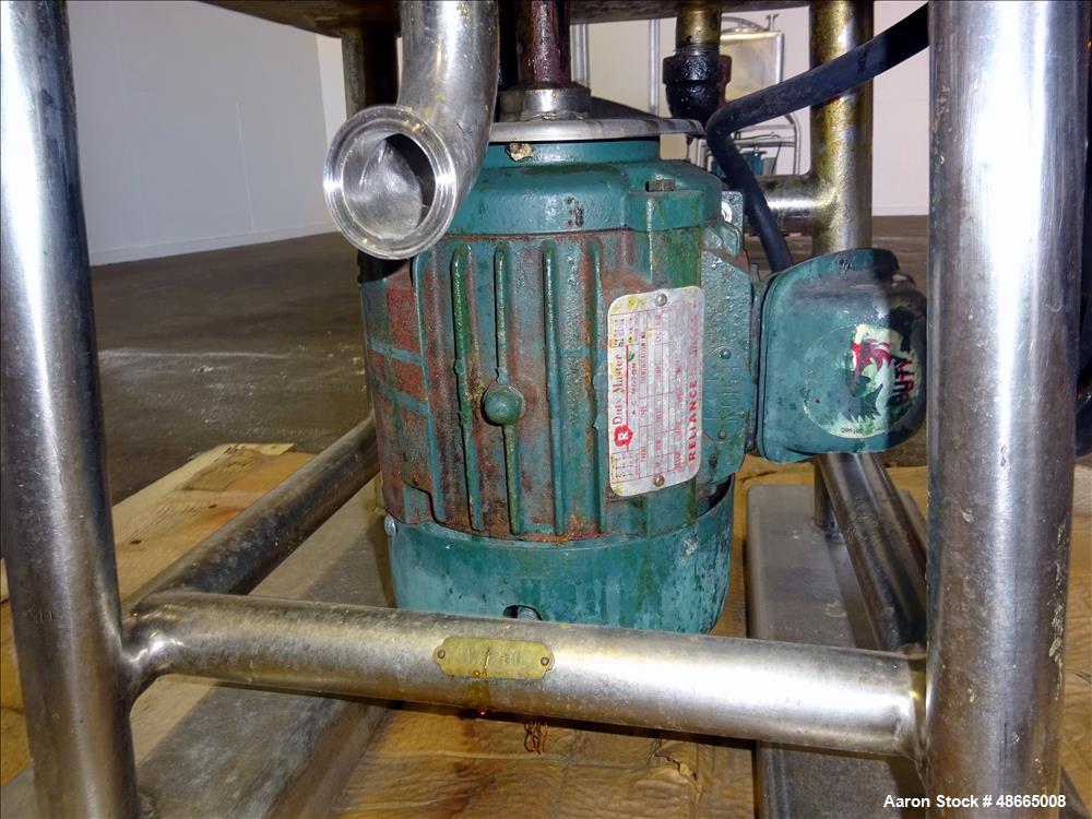 Used Norman Likwifier, 304 Stainless Steel, Approximate 17.5 Gallon, Vertical.