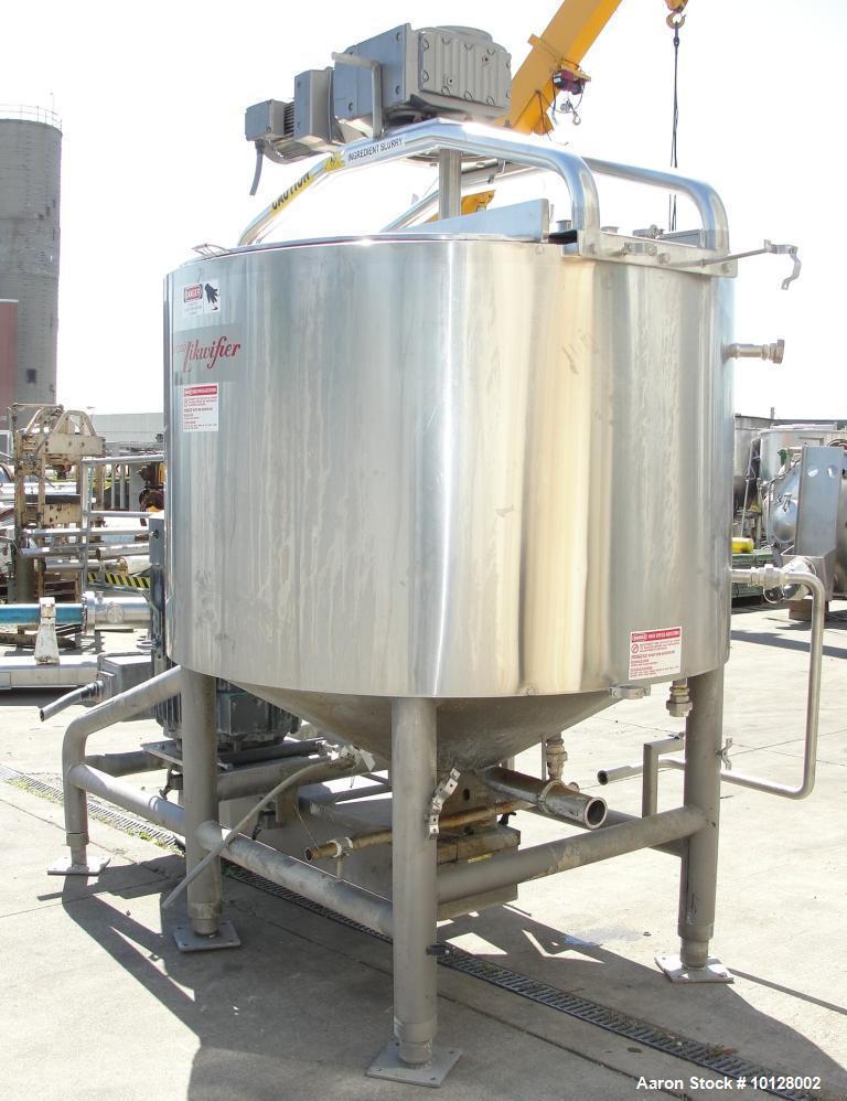 Used Breddo Likwifier 600 Gallon, 316 Stainless Steel, Jacketed Scrape Surface Contical Bottom Blender, Model LORWWSS.  Interior dimensions 64" diameter x 40" straight side height x 15" cone.  Overal...