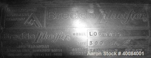 Unused: Breddo Likwifier, 300 gallon, model LORWWSS, 316 stainless steel. Dimple jacketed chamber 64" diameter x 21" straight side x coned bottom.Open top with (2) hinged covers, bolt on stainless st...