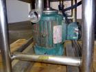Used Norman Likwifier, 304 Stainless Steel, Approximate 17.5 Gallon, Vertical.