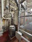 Used Walker Stainless Jacketed 500 Gallon Stainless Liquifier/Multi-Motion Mixer, Model PZ-MM. 316L stainless steel. Jacket rated 120 psi at 350 degrees F. Top mounted agitator with scraper/sweep bla...