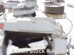 USED: Eirich mixer DEV29/6. Counter current, batch type, carbon steel.210 cu ft max, chamber 114" dia x 53" high. Wear plate liners side &bottom. Dust hood w/charge port. Pan drive (2) 15  hp3/60/575...