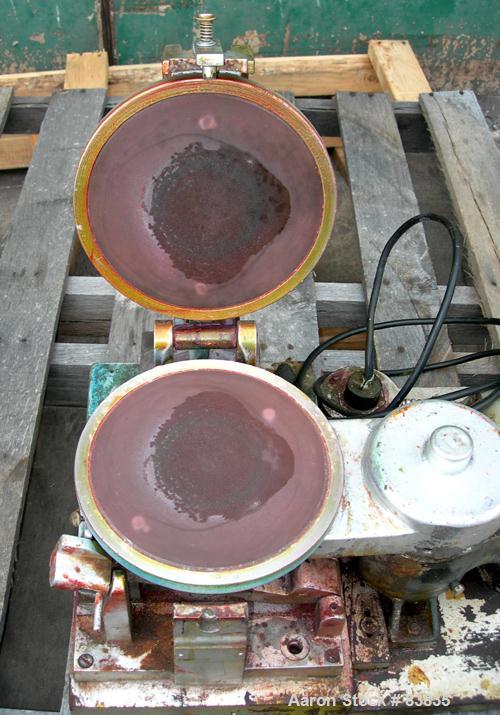 USED: Hoover automatic muller, model 4B. Unit consists of (2) 7-1/2" diameter glass plates, one of which rotates at a constant speed over a stationary plate causing shear forces to develop which simu...