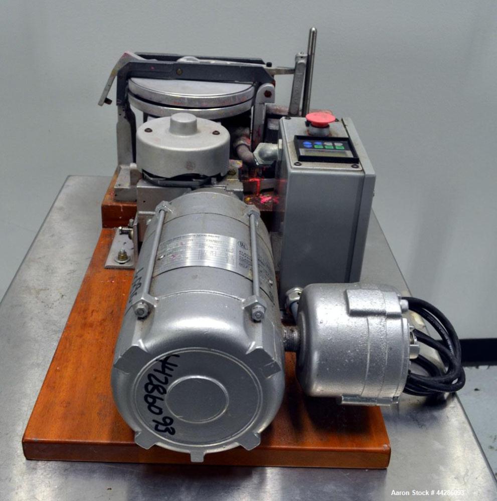 Used Hoover Color Corp. Automatic Muller, Model M5. Unit consists of (2) 7-1/2" Diameter glass plates, one of which rotates at a constant speed over a stationary plate causing shear forces to develop...