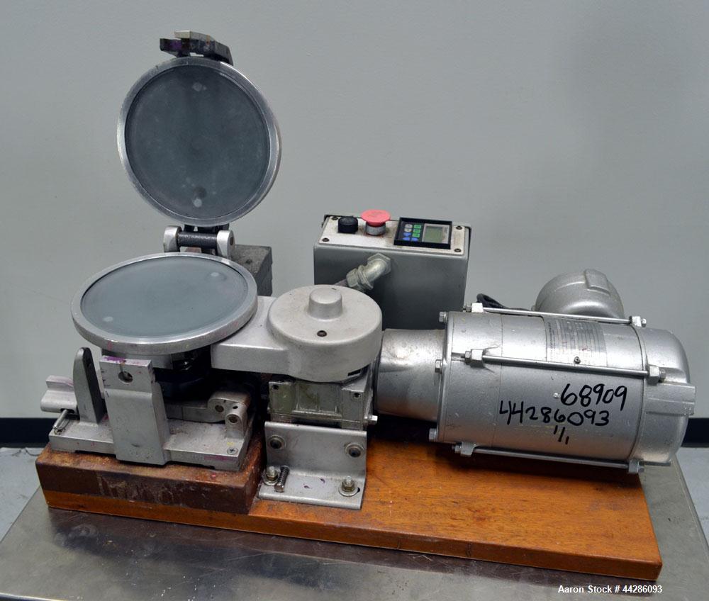 Used Hoover Color Corp. Automatic Muller, Model M5. Unit consists of (2) 7-1/2" Diameter glass plates, one of which rotates at a constant speed over a stationary plate causing shear forces to develop...