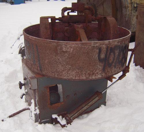 Used National Engineering Simpson Mix-Muller. 36" diameter 304 stainless steel pan.(2) 16'' diameter x 3'' wide carbon steel mulling wheels, (1) scraper. Approximate 6'' x 12'' side bottom outlet wit...