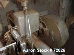 Used Simpson Multi-Mull Continuous Mixer, Model 21GP, 304 Stainless Steel. Capacity approximately 30 Tons/HR. Figure 8 style cribs 54" diameter x 30" deep. (4) 20" diameter x 5" wide mulling wheels w...