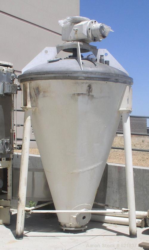 USED: Ross V Series vertical blender, model V40. Approximately 70"diameter x 8' high, dish top. 7.5 hp motor. Designed for vacuumoperation. Unsupported mixing screw.