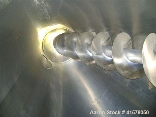 Used Hosokawa Conical Nauta Mixer, Model DBXE 1000, Approximately 35.3 cubic feet capacity (1000 liter), stainless steel. Approximately 68'' diameter x 85'' deep. Flat bolted top. Screw driven by a 2...