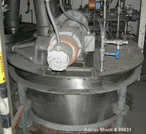 USED: J H Day nauta mixer, FA-35 Mark II, 35 cubic feet working capacity, 304 stainless steel. 69-3/8" OD x 87" straight side. Flat bolt down top cover with a 16-1/2" manway with cover. Screw driven ...