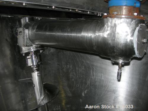 USED: J H Day Nauta mixer, 70 cubic foot working capacity, 304 stainless steel. Approximately 83" diameter x 115" straight side. Non-jacketed. 1/3 cover. Approximate 8" diameter pintle bearing bottom...
