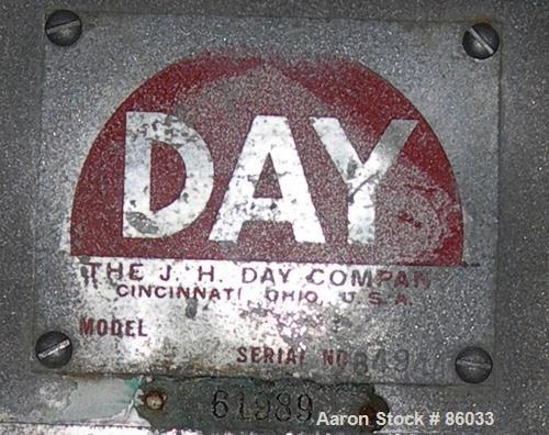 USED: J H Day Nauta mixer, 70 cubic foot working capacity, 304 stainless steel. Approximately 83" diameter x 115" straight side. Non-jacketed. 1/3 cover. Approximate 8" diameter pintle bearing bottom...