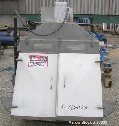 USED: J H Day Nauta mixer, 70 cubic foot working capacity, 304 stainless steel. Approximately 83" diameter x 115" straight side. Non-jacketed. 1/3 cover. Approximate 8" diameter pintle bearing bottom...