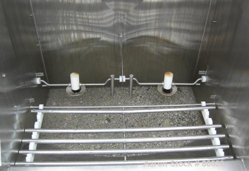 USED: J H Day Nauta mixer, 70 cubic foot working capacity, 304 stainless steel. Approximately 83" diameter x 115" straight side. Non-jacketed. 1/3 cover. Approximate 8" diameter pintle bearing bottom...