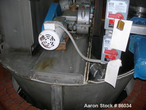 USED: J H Day Nauta mixer, 70 cubic foot working capacity, 304 stainless steel. Approximately 83" diameter x 115" straight side. Non-jacketed. 1/3 cover. Approximate 8" diameter pintle bearing bottom...