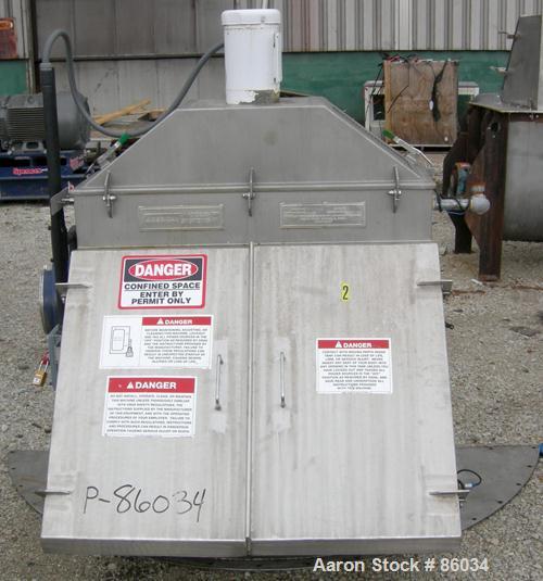 USED: J H Day Nauta mixer, 70 cubic foot working capacity, 304 stainless steel. Approximately 83" diameter x 115" straight side. Non-jacketed. 1/3 cover. Approximate 8" diameter pintle bearing bottom...