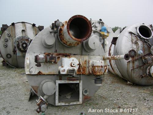 Used J.H. Day Nauta Mixer, Type MBX, 70 Cubic Feet, 304 Stainless Steel. 83" Diameter x 122" long. Flat bolted top, pintle bearing. Top openings include (2) 12", (1) 9", (1) 18", 20" x 23" service do...