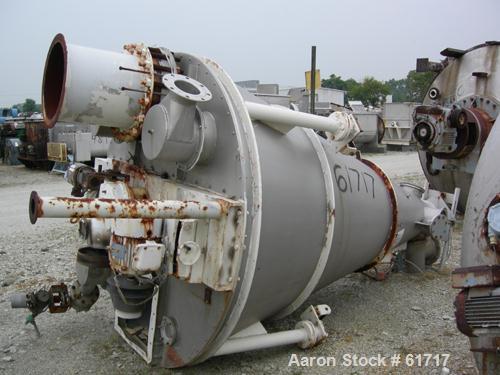 Used J.H. Day Nauta Mixer, Type MBX, 70 Cubic Feet, 304 Stainless Steel. 83" Diameter x 122" long. Flat bolted top, pintle bearing. Top openings include (2) 12", (1) 9", (1) 18", 20" x 23" service do...