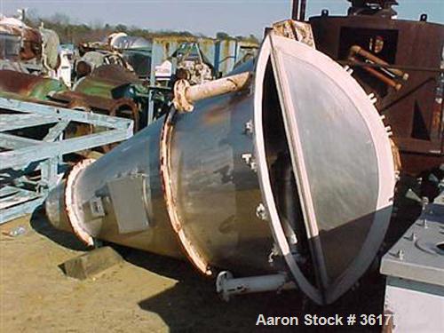 Used J.H. Day Nauta Mixer, 27 Cubic Feet, 304 Stainless Steel. 66" diameter x 72" high, polished internal, 1.5 hp, 5 hp 190/380 volt drives. Missing mixing screw, discharge, and pintle bearing.