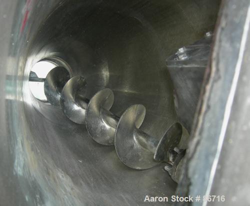 Used J H Day Nauta Mixer, 1.75 Cubic Foot Working Capacity, 304 Stainless Steel. Approximately 28" diameter x 36" straight side. 2/3 dimple jacket rated 125 PSI at 353 Degrees F, (2) 1/3 covers. Appr...